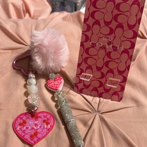 Pink Heart and Pom-Pom Keychain with matching rhinestone pen and phone holder.